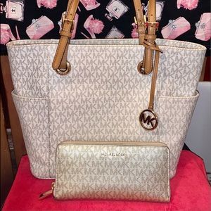 Micheal Kors Shoulder Purse with Matching Wallet.